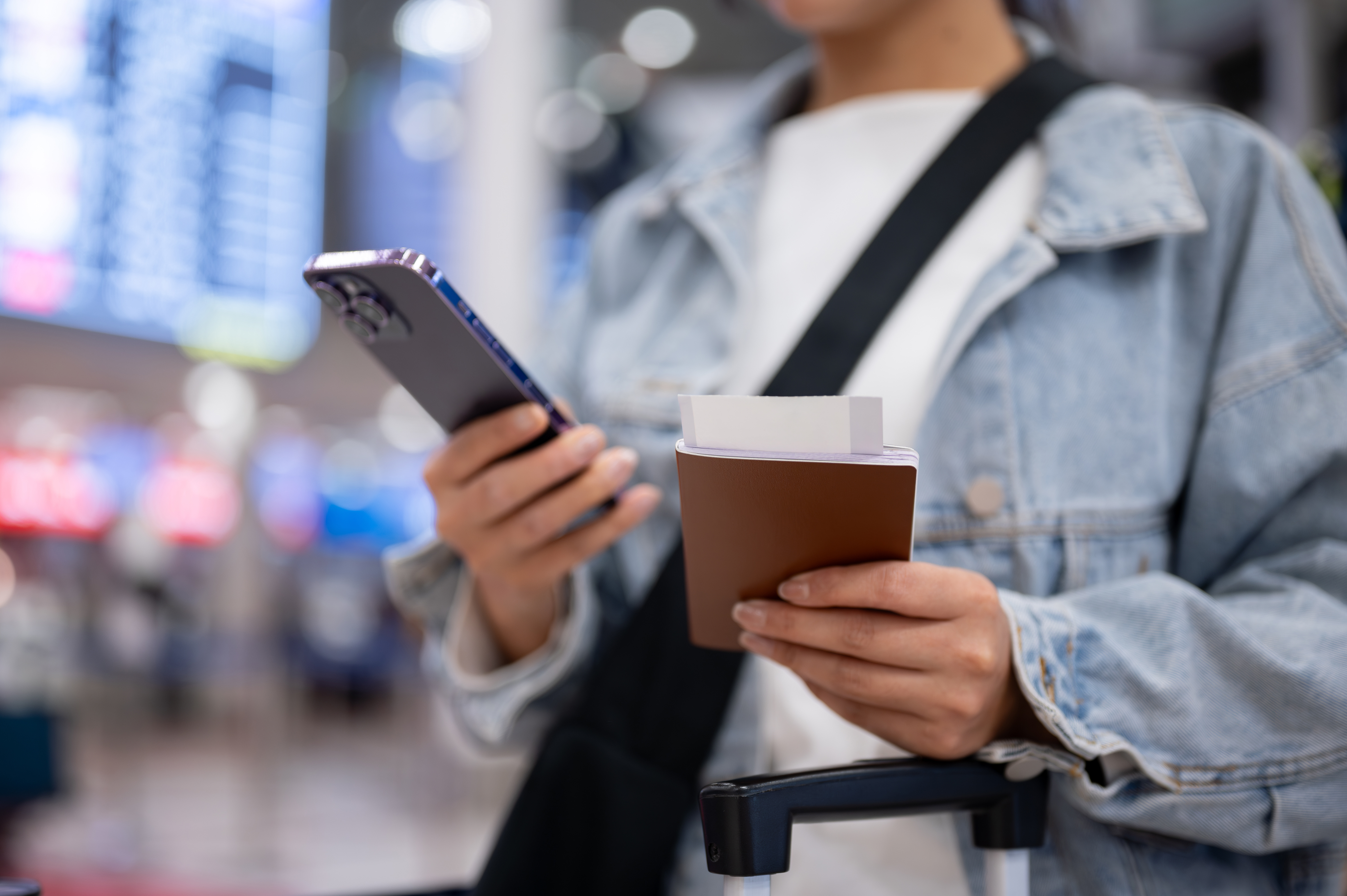 traveler at airport with passport